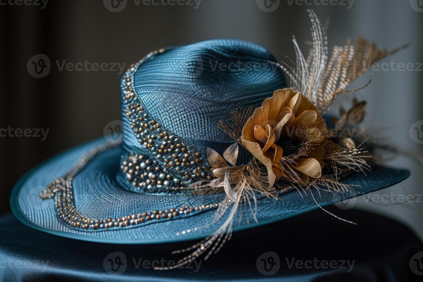 Elegant teal hat with embellishments and feather accents photo