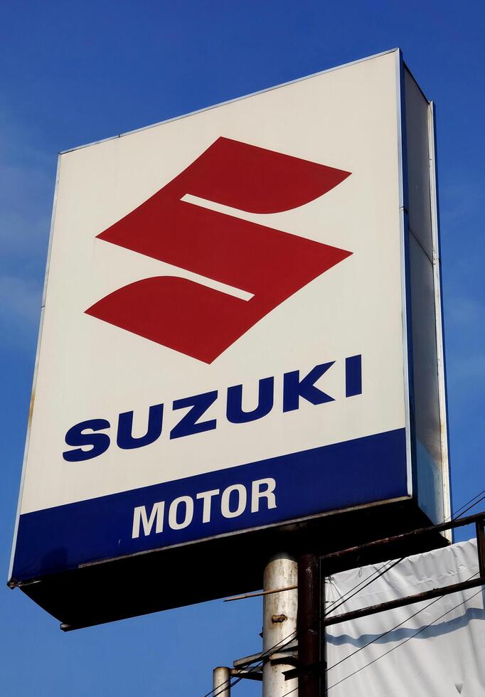 Semarang, Indonesia June 29 2024, suzuki logo on sign board. company identity sign and symbol. photo