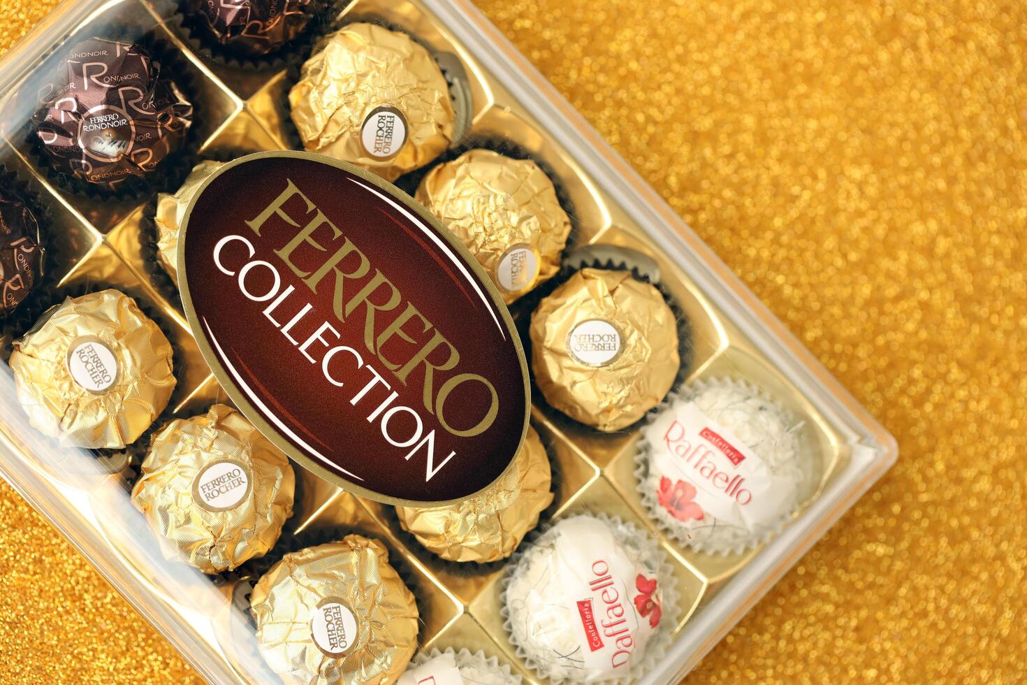 KYIV, UKRAINE - APRIL 20, 2024 Ferrero collection chocolate products. Ferrero Rocher is chocolate confectionery produced by Italian chocolatier which was founded in 1946 photo