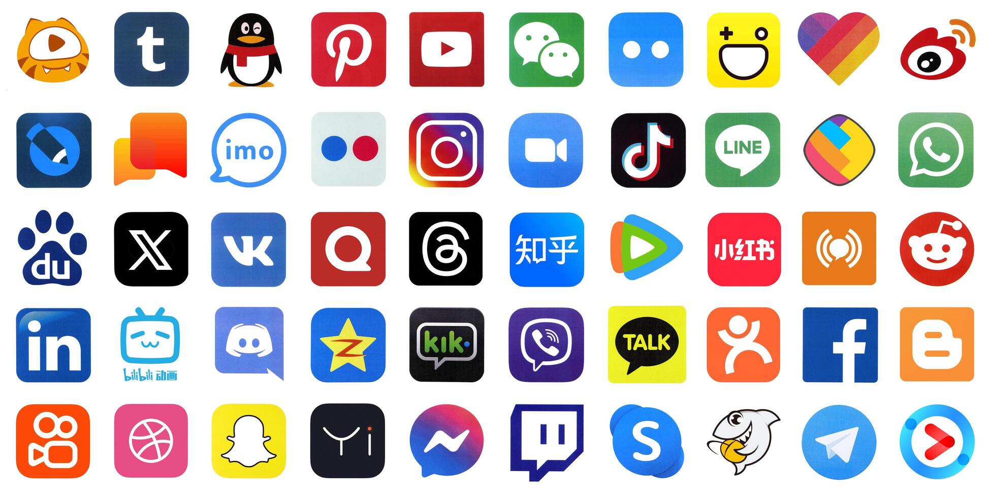 KYIV, UKRAINE - APRIL 1, 2024 Many icons of social media, messengers, sharing platforms photo