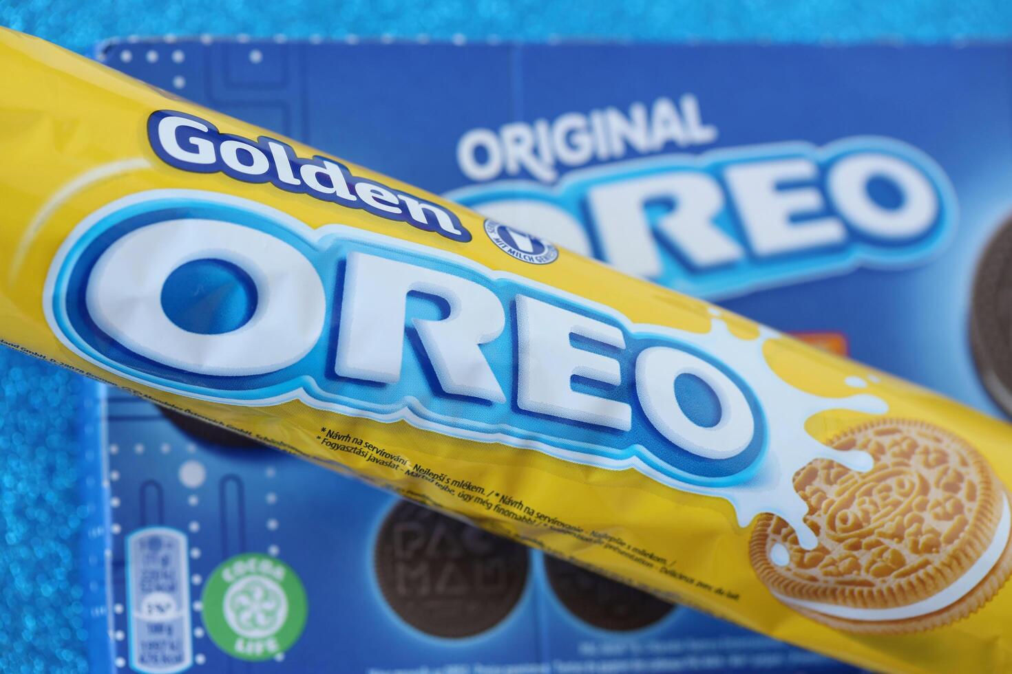 KYIV, UKRAINE - APRIL 20, 2024 Oreo Golden and pac-man crispy cookies packs. The brand Oreo owned by american company Mondelez international photo