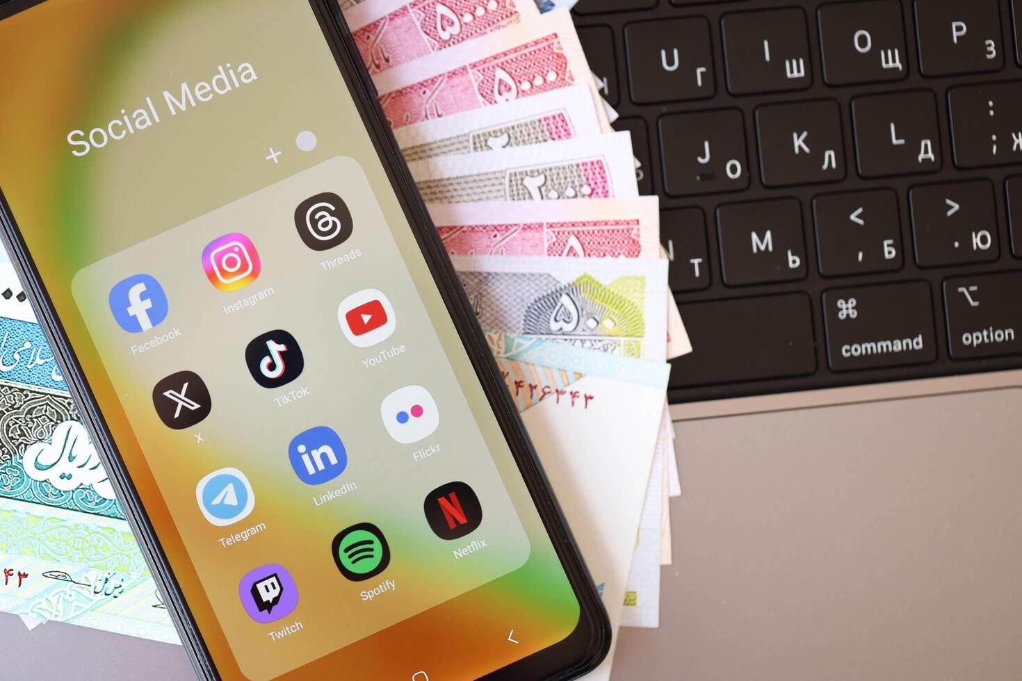 KYIV, UKRAINE - FEBRUARY 28, 2024 Social Media icons group on Galaxy A04s smartphone display photo