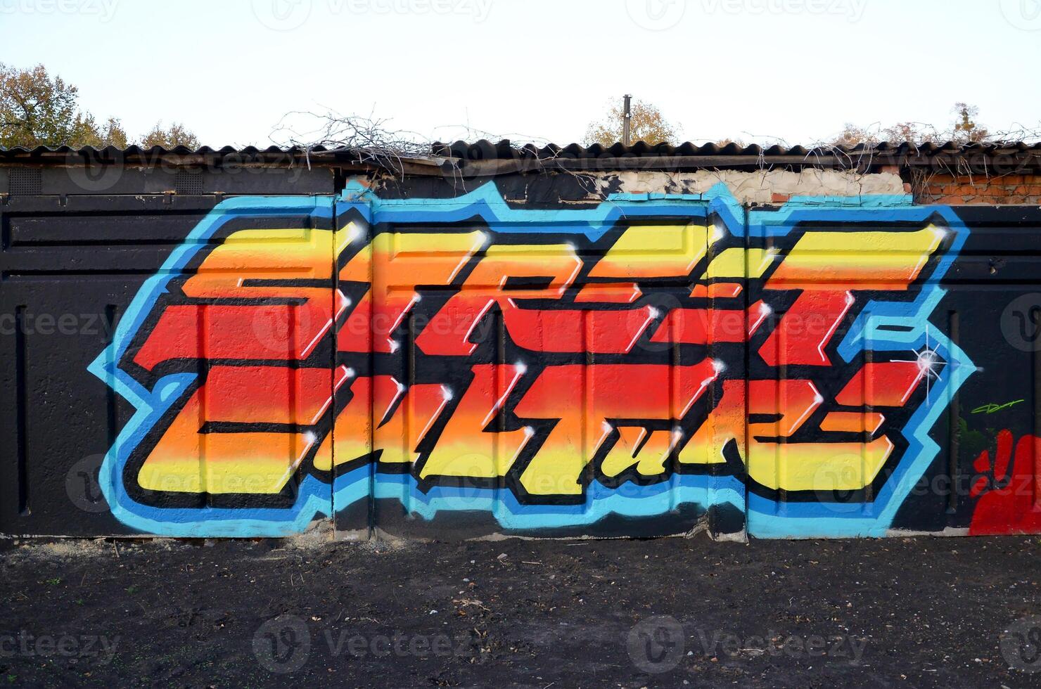 Colorful background of graffiti painting artwork with bright aerosol outlines on wall. Old school street art piece made with aerosol spray paint cans. Contemporary youth culture photo