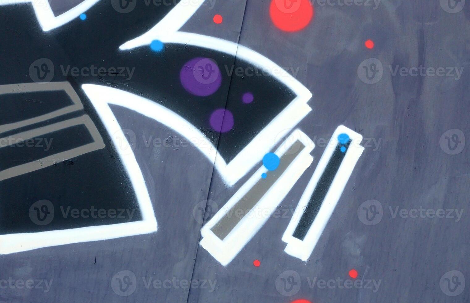 Colorful background of graffiti painting artwork with bright aerosol outlines on wall. Old school street art piece made with aerosol spray paint cans. Contemporary youth culture photo