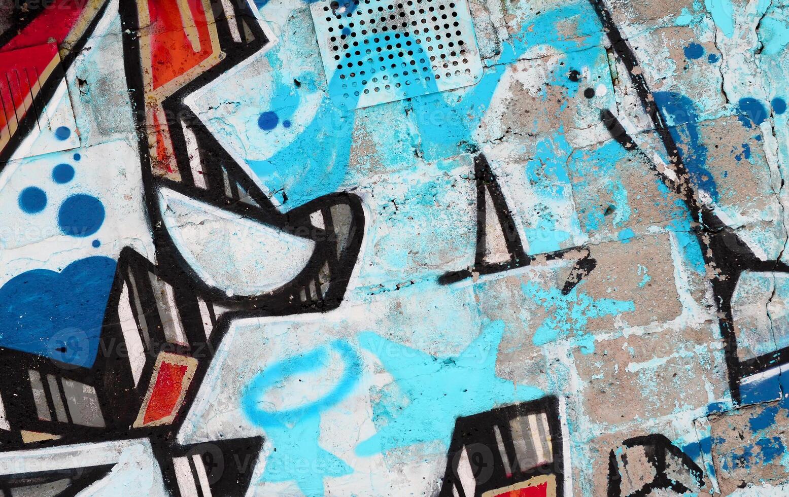 Colorful background of graffiti painting artwork with bright aerosol outlines on wall. Old school street art piece made with aerosol spray paint cans. Contemporary youth culture photo