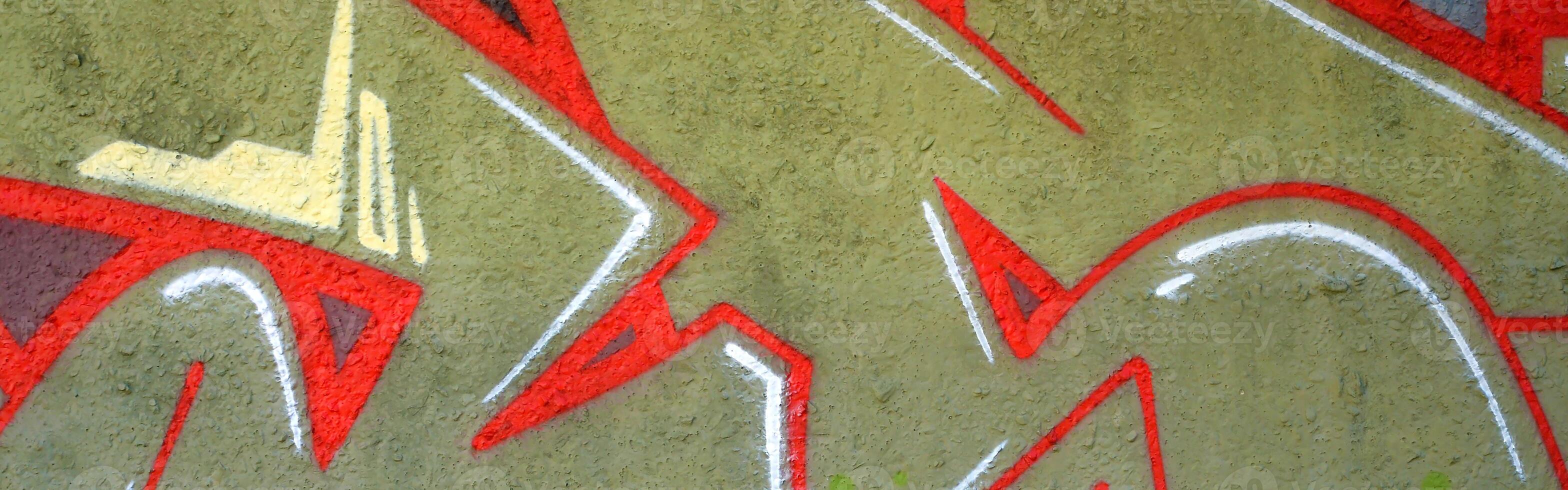 Colorful background of graffiti painting artwork with bright aerosol outlines on wall. Old school street art piece made with aerosol spray paint cans. Contemporary youth culture photo