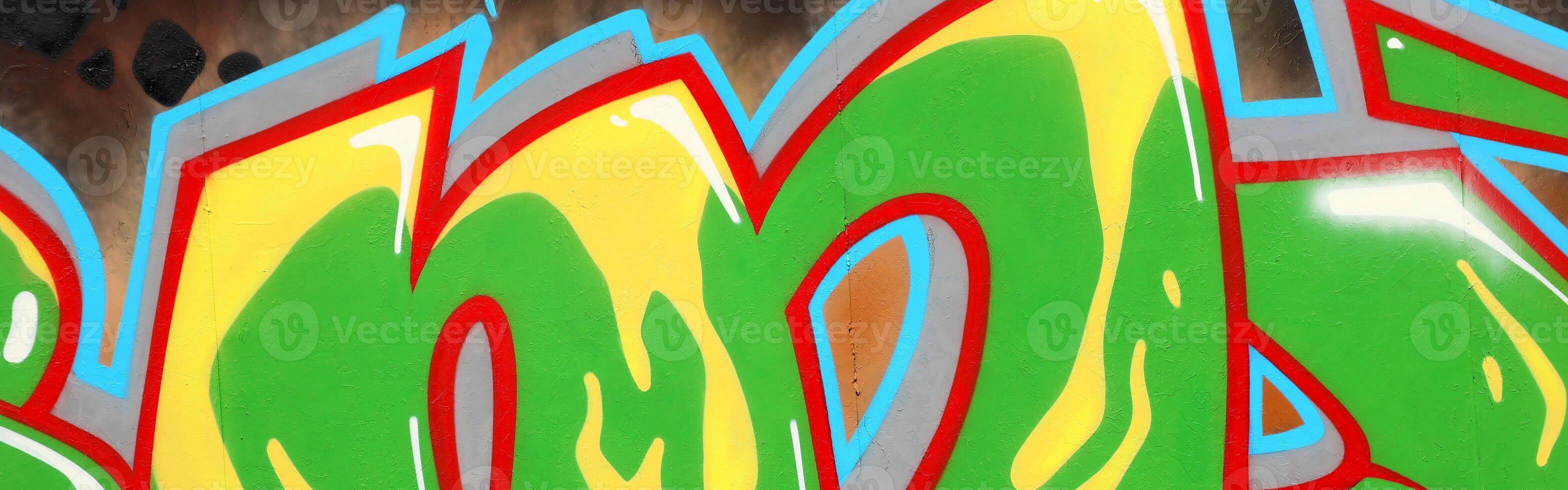 Colorful background of graffiti painting artwork with bright aerosol outlines on wall. Old school street art piece made with aerosol spray paint cans. Contemporary youth culture photo