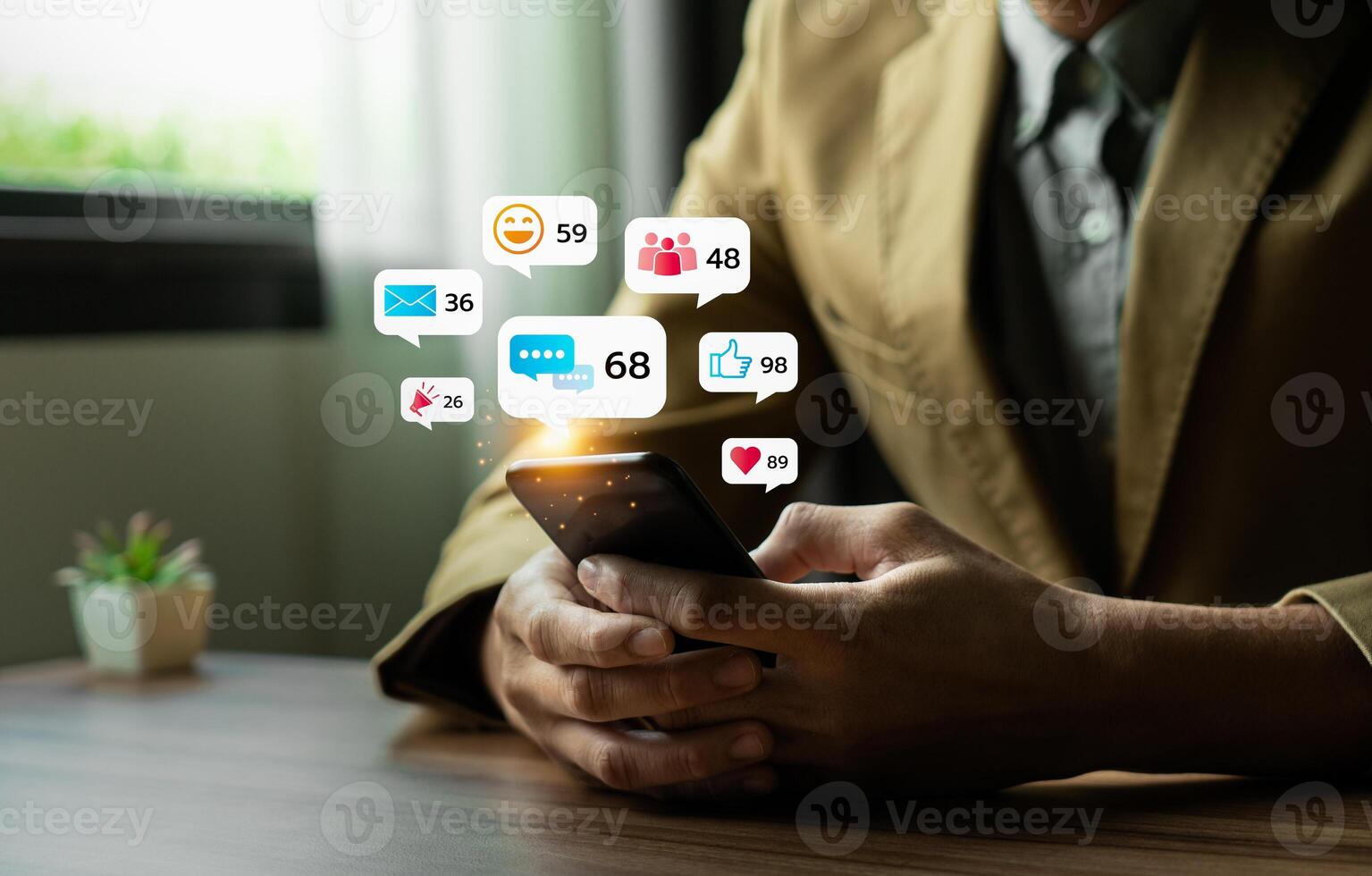 Young Man Using Smartphone with Multiple Social Media Notifications Displayed on Screen, Engaging in Digital Communication and Social Networking, Busy Lifestyle with Technology Interaction photo