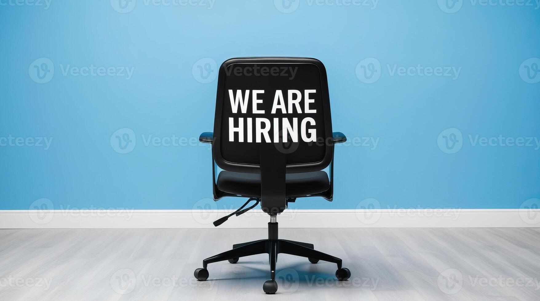 Office chair with We Are Hiring text on blue Background, symbolizing job opportunities and recruitment. photo