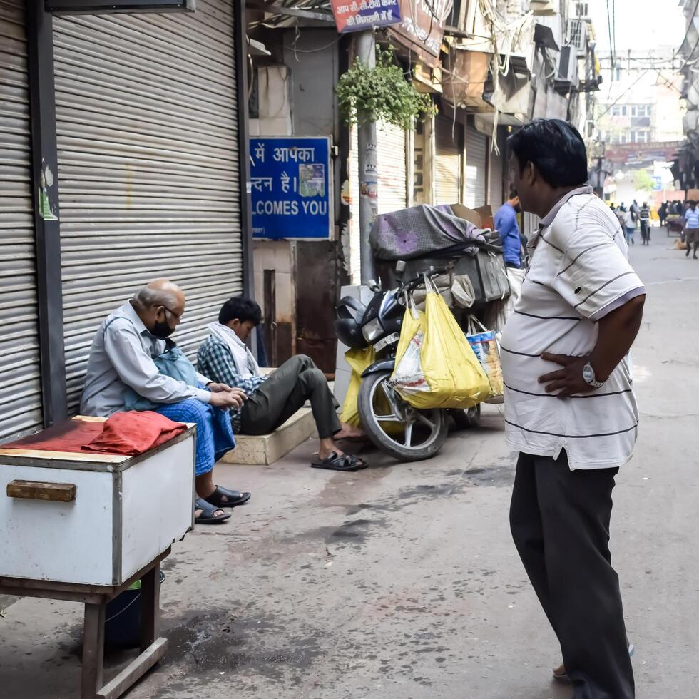 Old Delhi, India, June 30, 2024 - Unidentified people in the streets of Old Delhi, Street Photography of Chandni Chowk market of Old Delhi during morning time, Old Delhi Street Photography photo