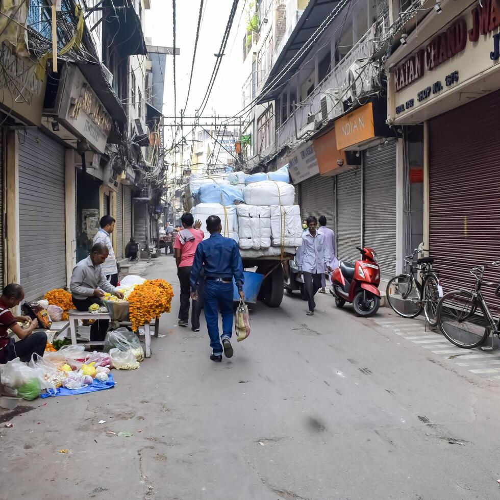 Old Delhi, India, June 30, 2024 - Unidentified people in the streets of Old Delhi, Street Photography of Chandni Chowk market of Old Delhi during morning time, Old Delhi Street Photography photo
