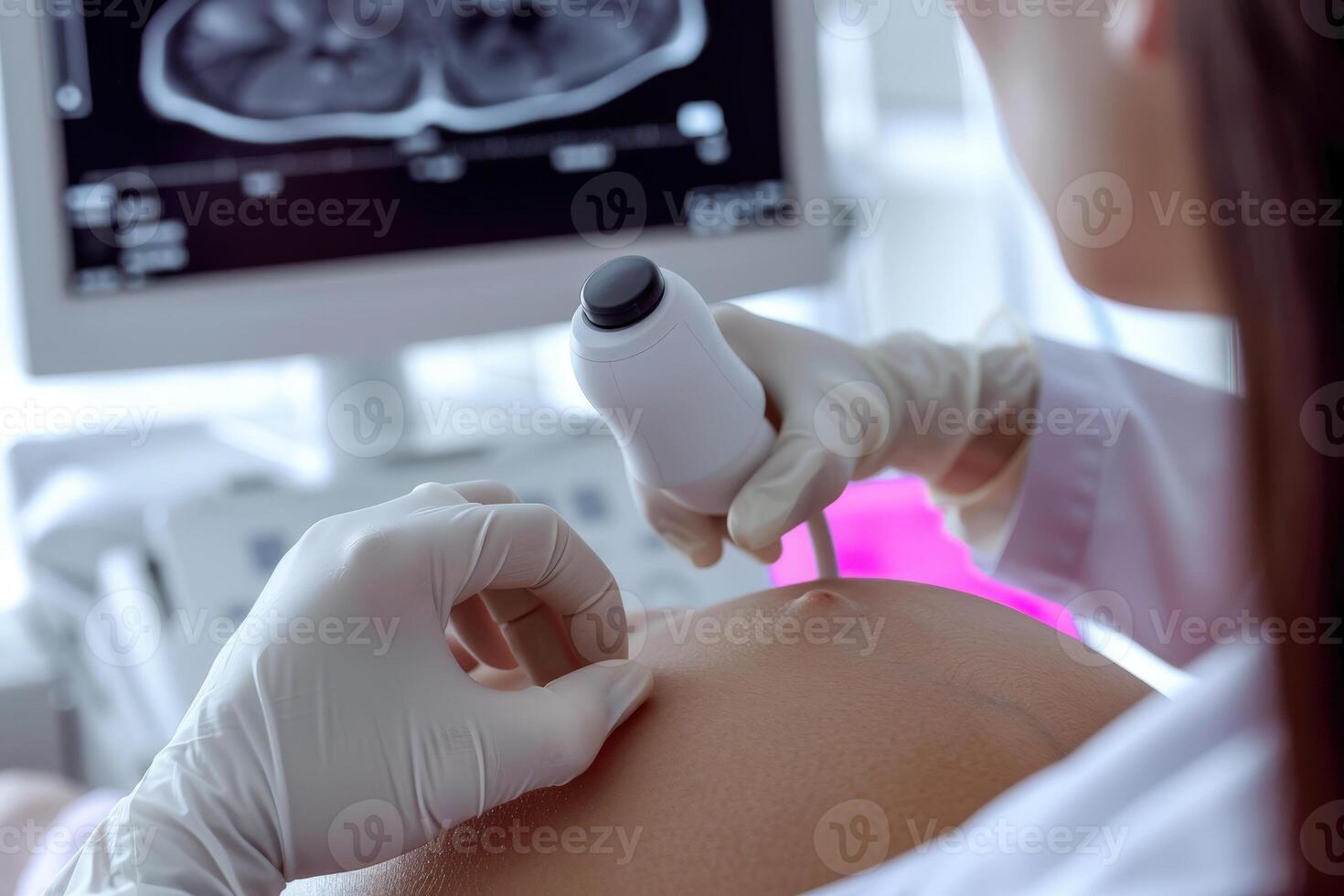 Pregnant Woman Experiences Joy in Hospital Ultrasound Checkup photo