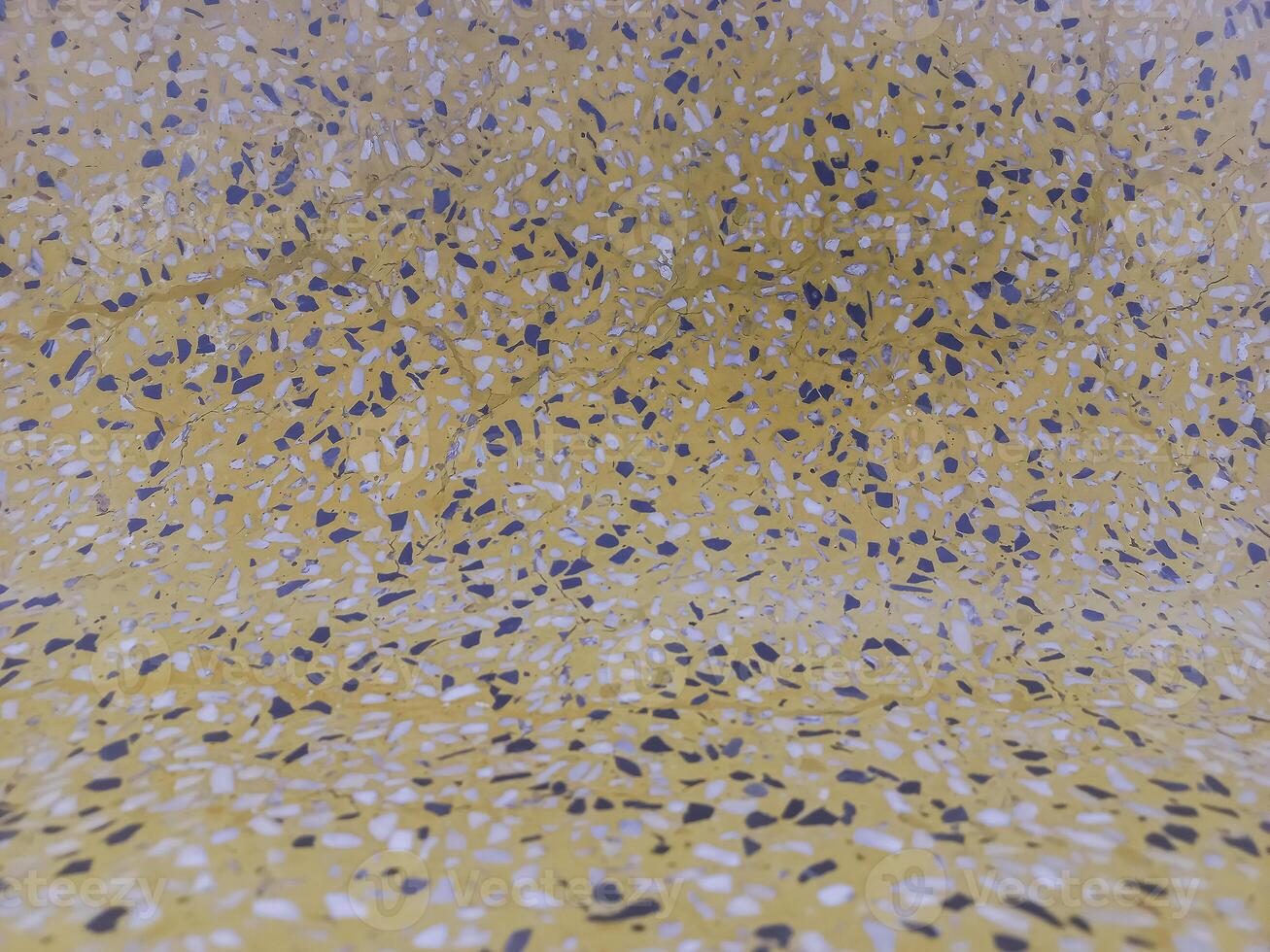 Smooth surface, yellow stone pattern. photo