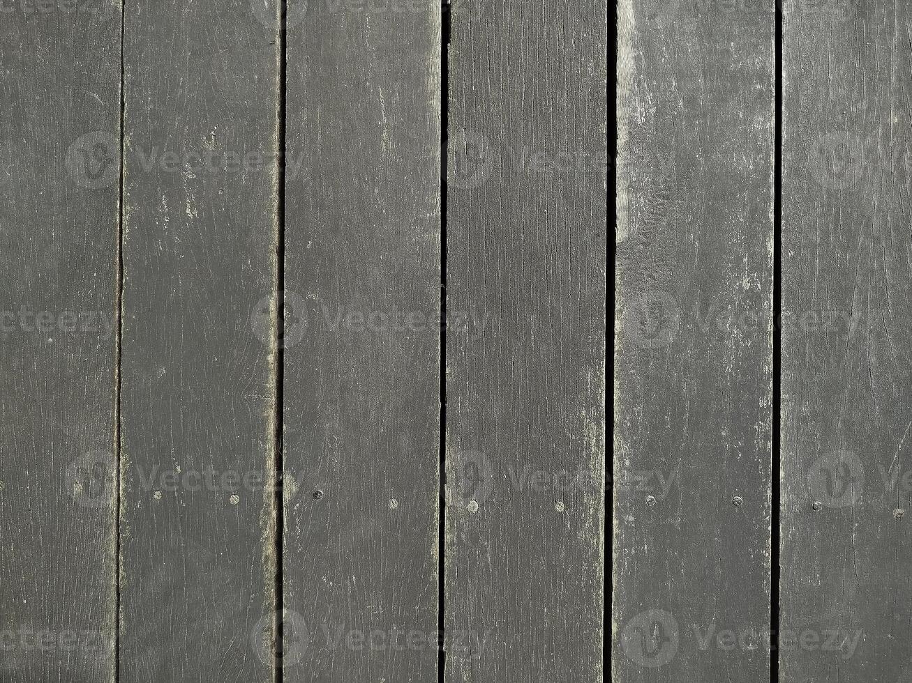 The wooden floor looks dirty and not clean. photo
