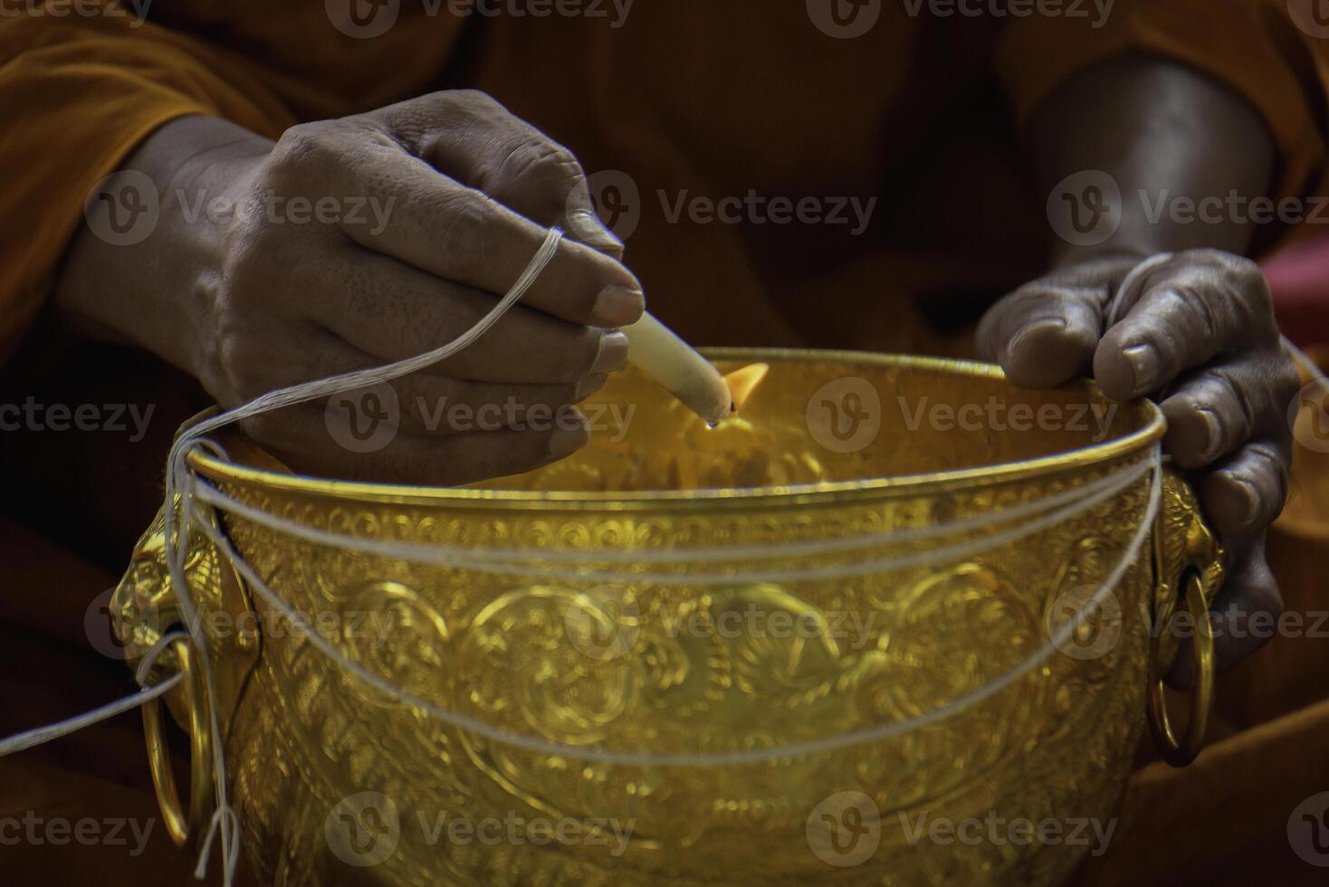making holy water, buddhism, beliefs in thailand photo