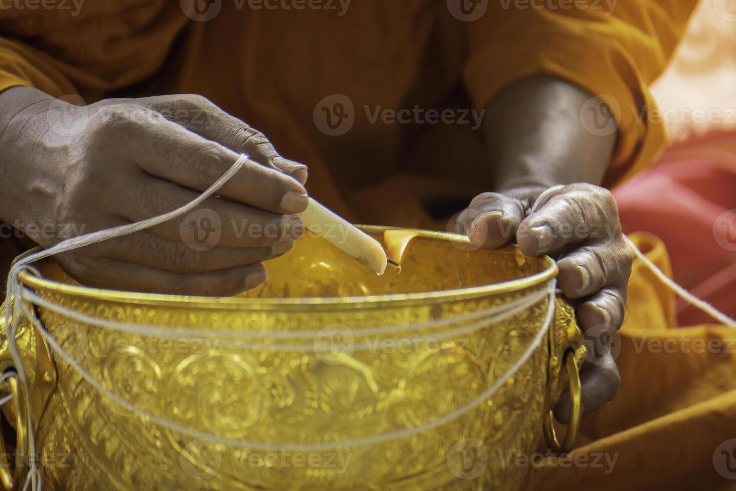 making holy water, buddhism, beliefs in thailand photo