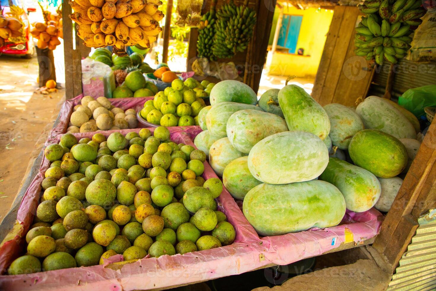 Road side fruit stall selling banana and other fruits photo