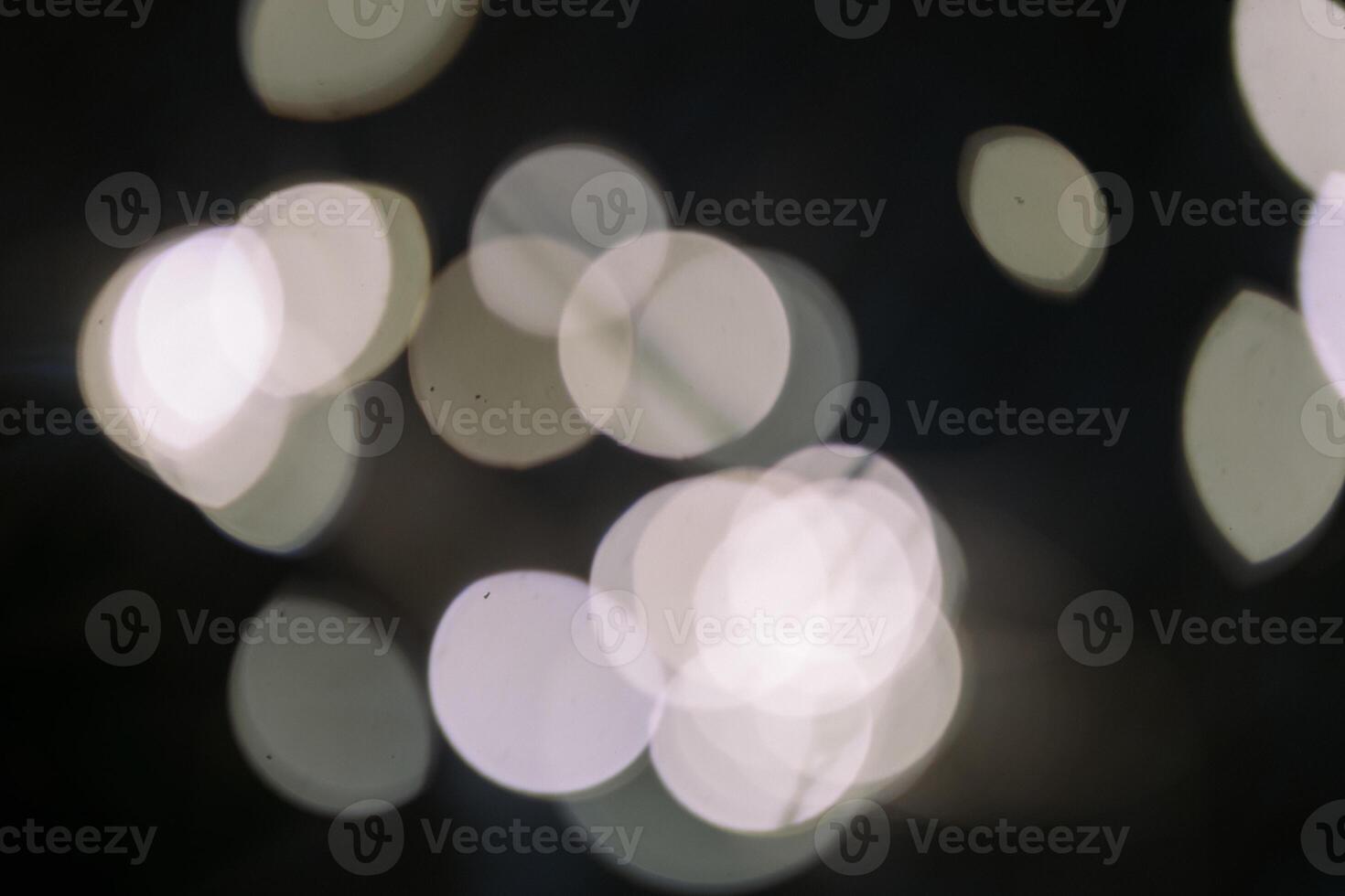 Blurred image of a light source, creating a soft, dreamy glow and ethereal atmosphere photo