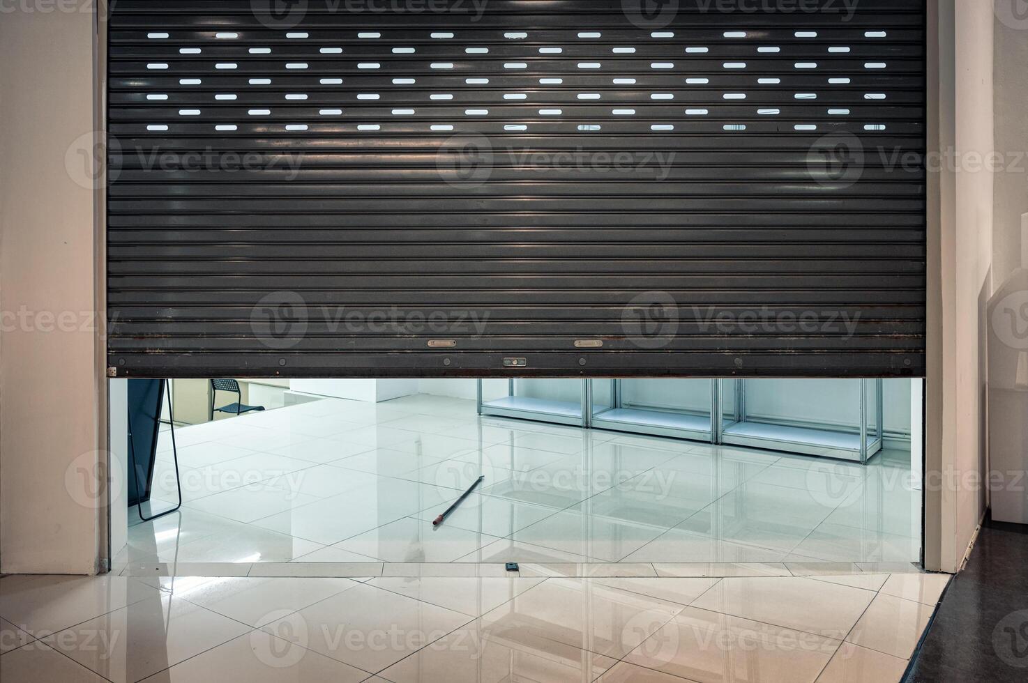 Abamdomed roll shutter gate of shop closing in department store photo