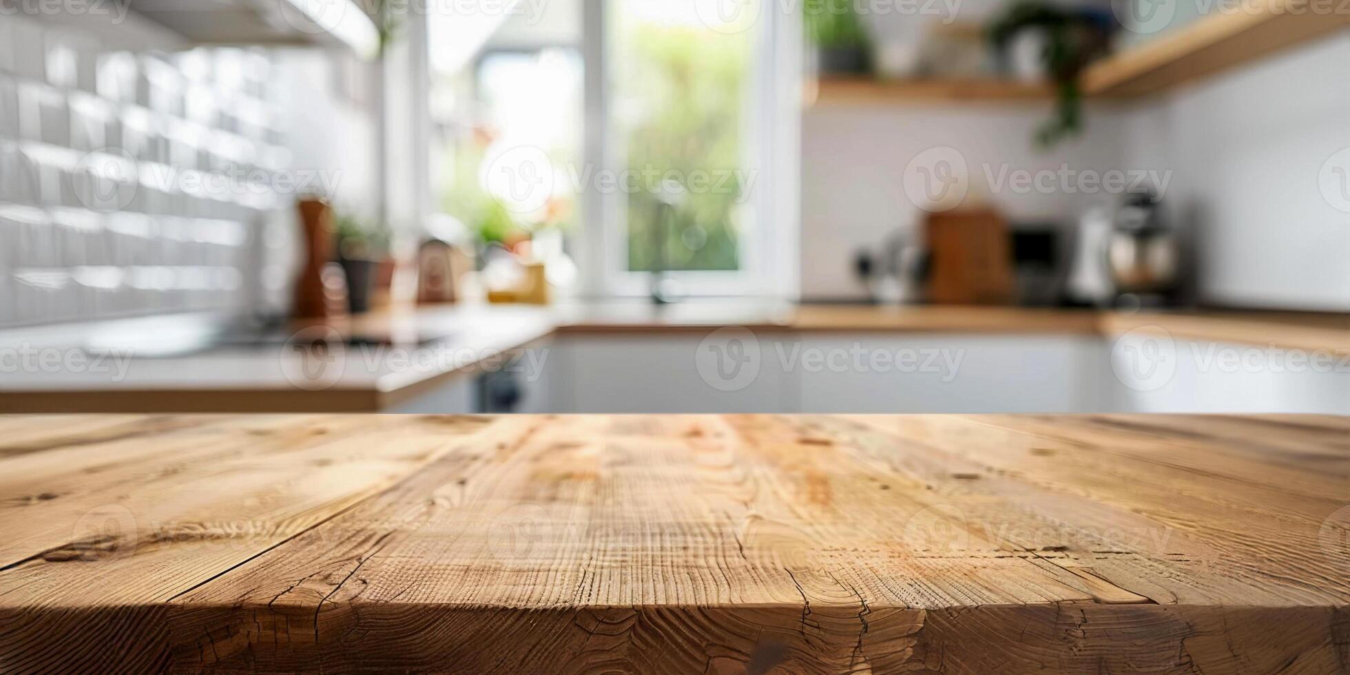Empty wooden table top with a blurred kitchen background for product display presentation or montage composition on the wood counter in a modern home interior design of a blurry white kitchen mockup photo