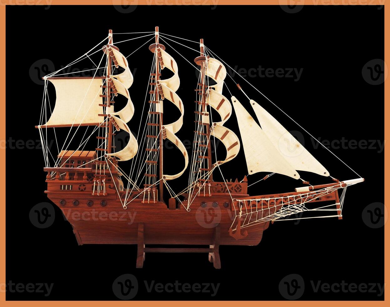 Barque ship gift craft model wooden,isolated on background Is a four-masted steel barque. Sedov, formerly named Magdalene Vinnen II, was built in Germany in 1921. photo