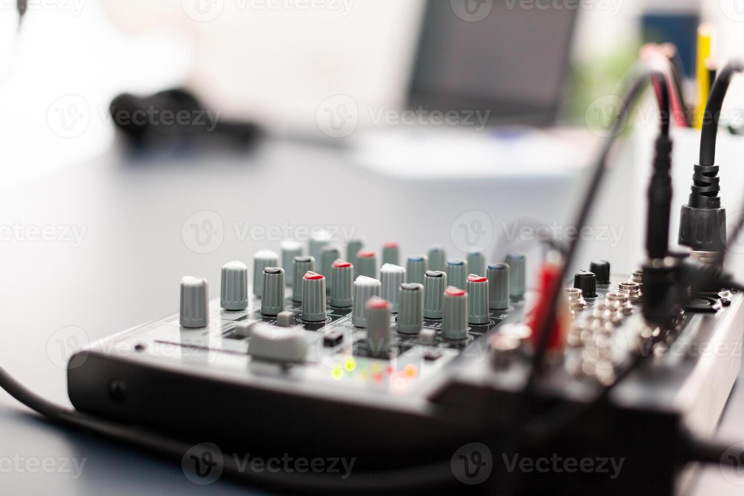 Mixer close up of vlogger home podcast studio. Social media influencer recording professional content with modern equipment and digital web internet streaming station photo