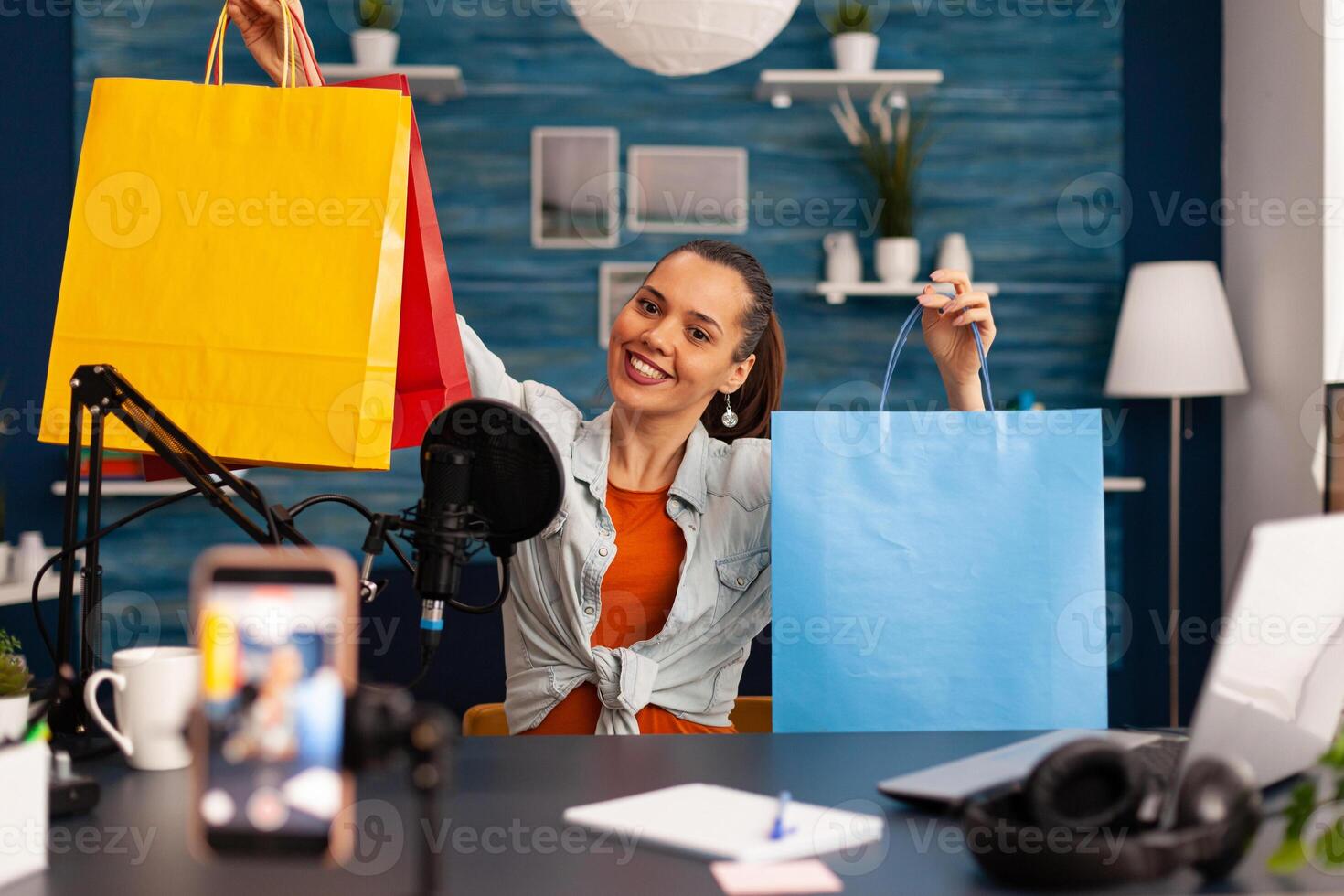 Blogger recording giveaway blog in home studio podcast using modern technology. Creative content creator influencer vlogger making online broadcast for subscribers audience photo
