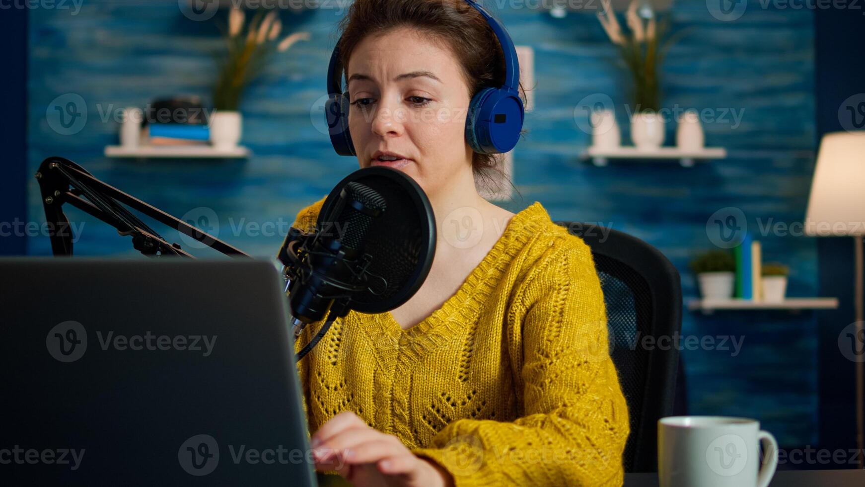 Vlogger looking at laptop while asking audience to subscribe on her channel. Creative online show On-air production internet broadcast host streaming live content, recording digital social media communication photo