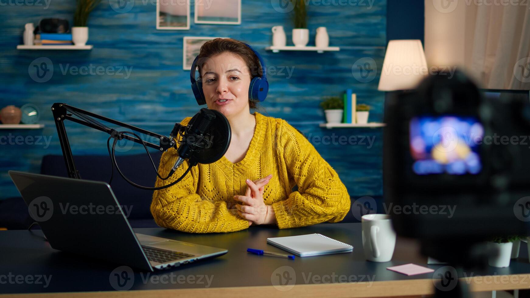 Blogger speaking about life during podcast in home studio looking at camera. Online show On-air production internet broadcast host streaming live content, recording digital social media communication photo