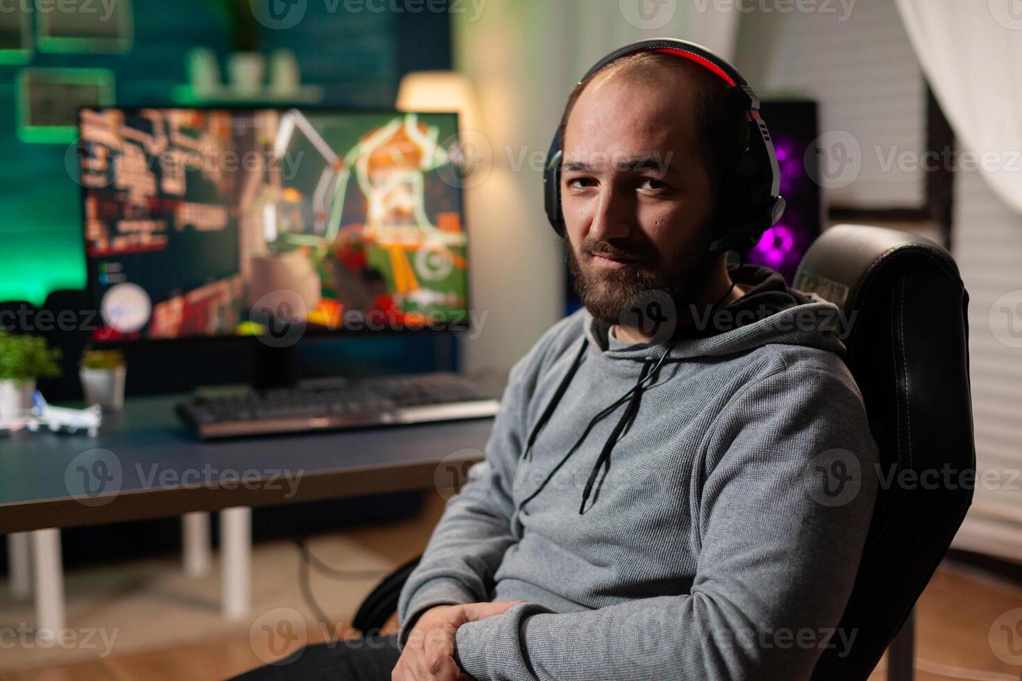 Woman gamer winning videogames with vr headset on powerful computer with professional joystick. Virtual online streaming cyber performing during game tournament using modern equipment. photo