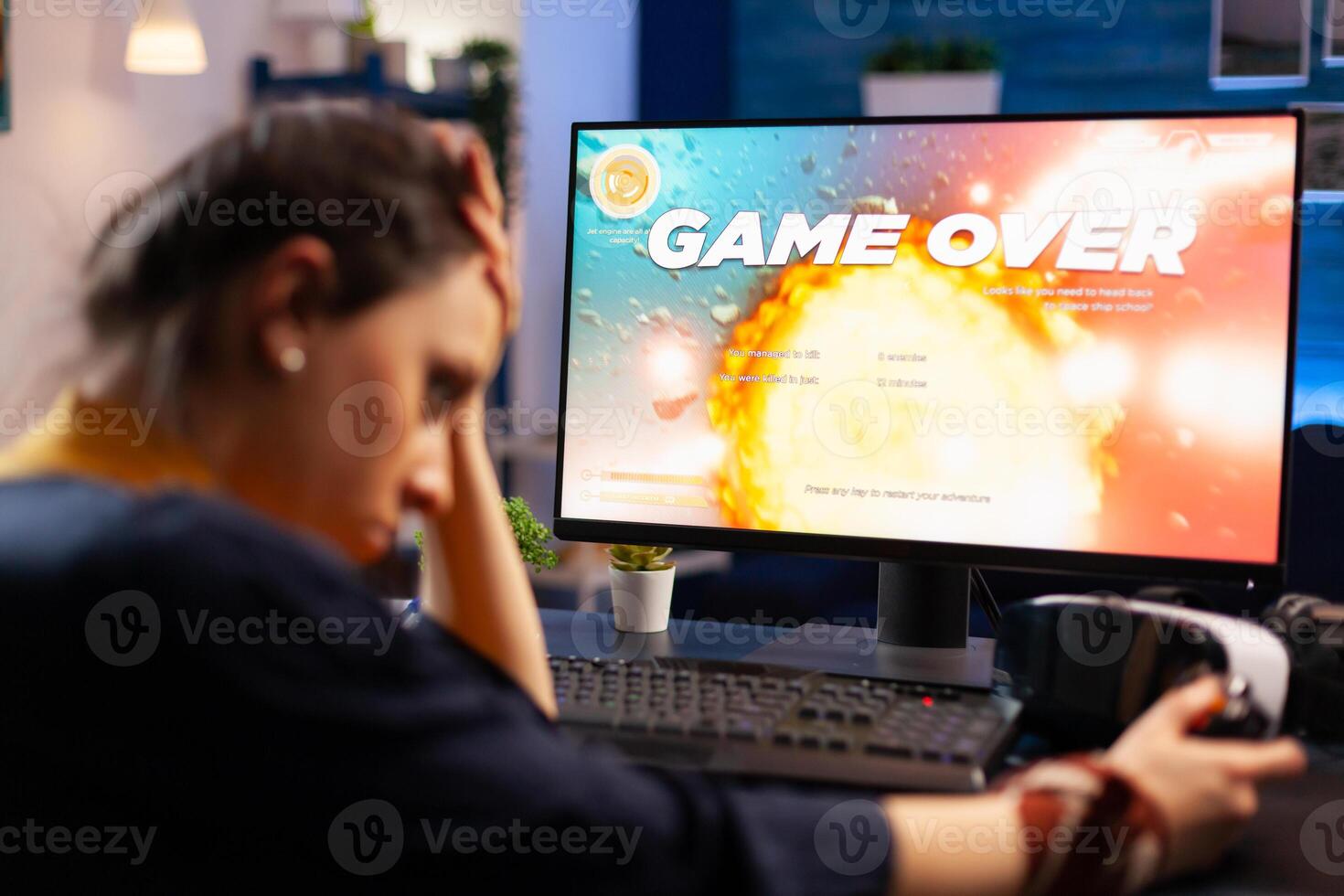 Caucasian gamer losing space shooter videogame competition on professional powerful computer. Professional pro gamer streaming online game with new graphics using modern equipment photo