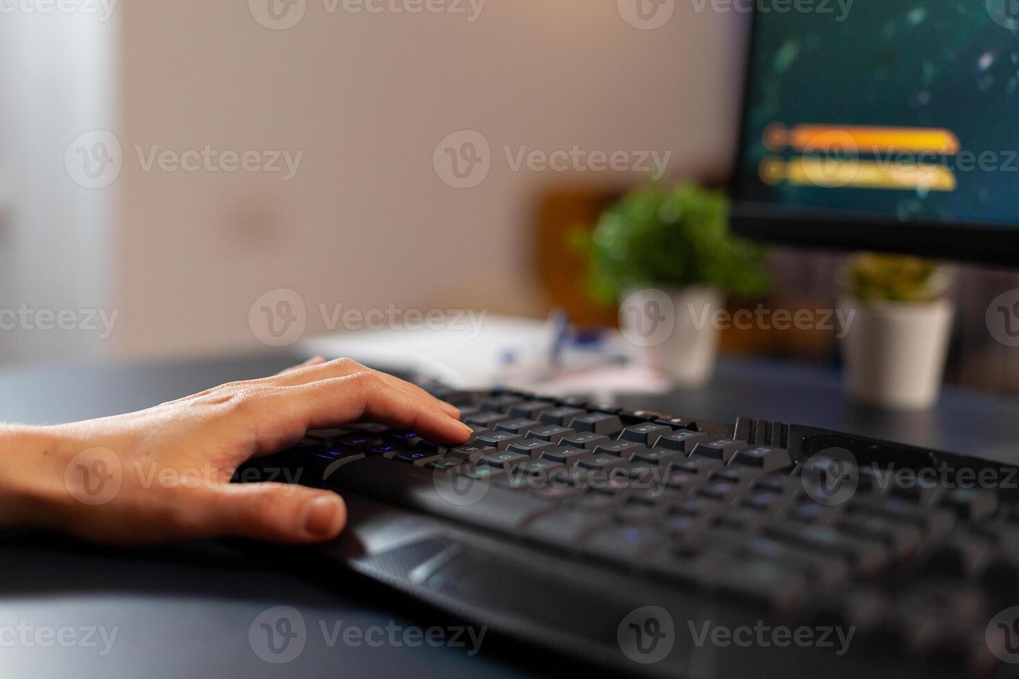Close up of RGB keyword in gaming home studio during live space shooter competition. Pro gamer streaming online videogames using technology network wireless photo