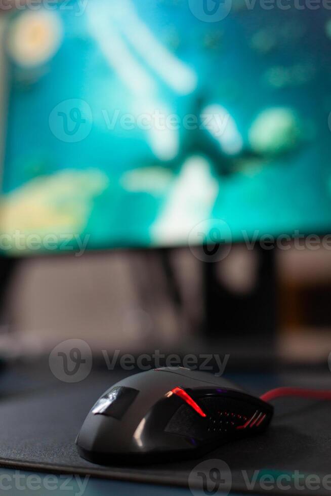 Close up of mouse in gaming home studio playing online videogames on professional powerful computer during live tournament photo