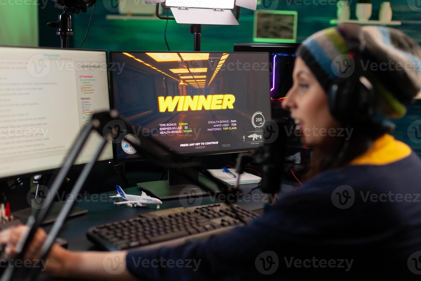 Streamer woman winning virtual videogame competition use professional equipment in home studio. Online streaming cyber performing during gaming tournament using technology network wireless photo