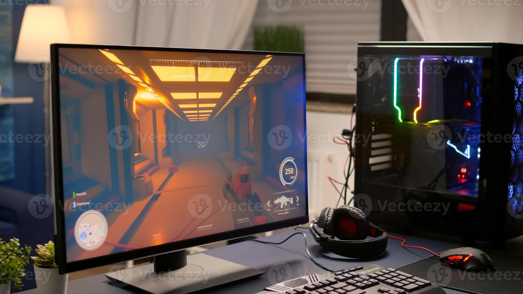 Close-up of empty gaming home studio equipped with RGB powerful system desktop, keyboard, mouse and professional headphones. Gamer playing first person shooter for online esport competition photo