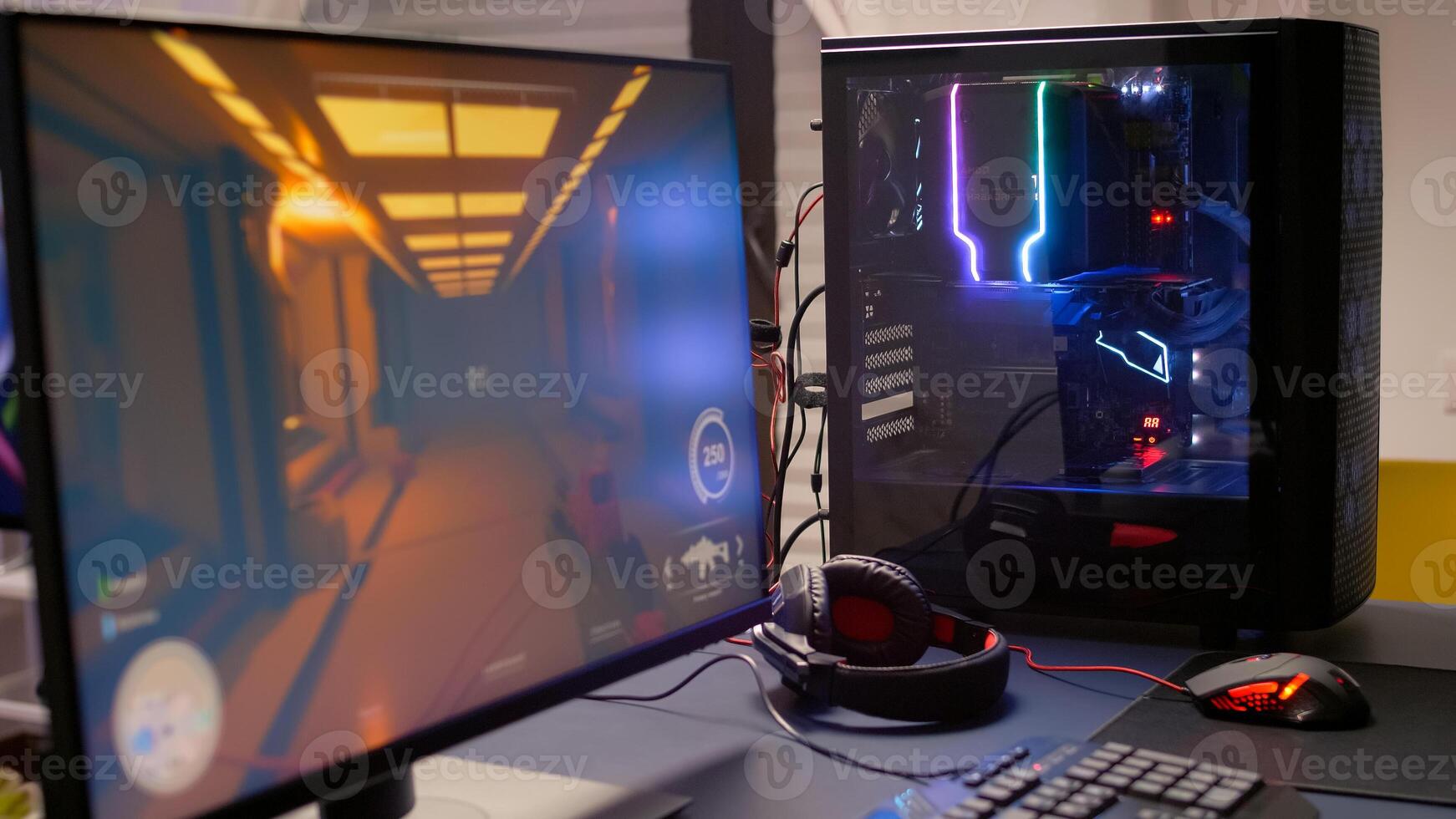 Close-up of professional monitor with first person shooter game on. Home studio of esport game player using powerful gaming computer during online competition photo