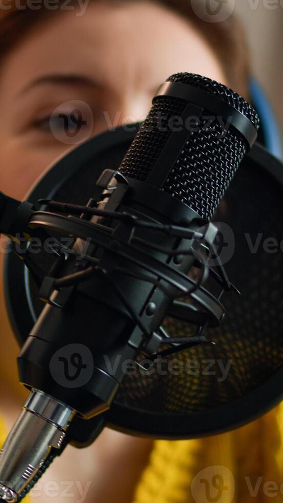 Woman vlogger answering questions from fans on online podcast show. Creative online show On-air production internet broadcast host streaming live content, recording digital social media communication photo
