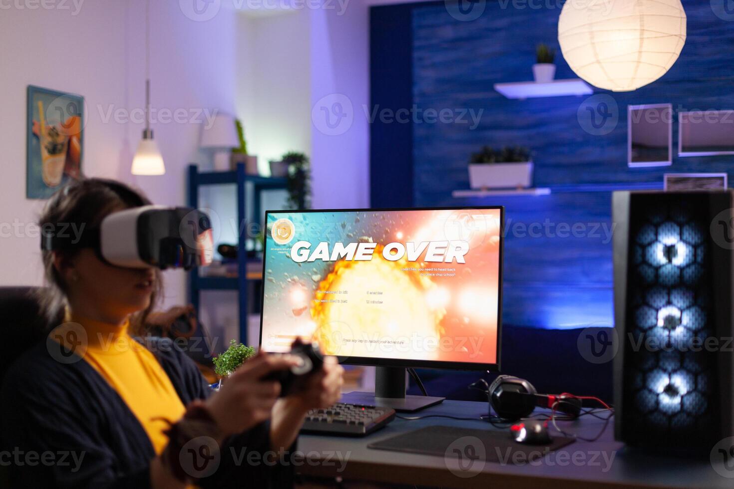 Player with vr headset losing games on computer. Woman playing game with controller and virtual reality headset on pc monitor. Person lost online game with goggles and joystick. photo