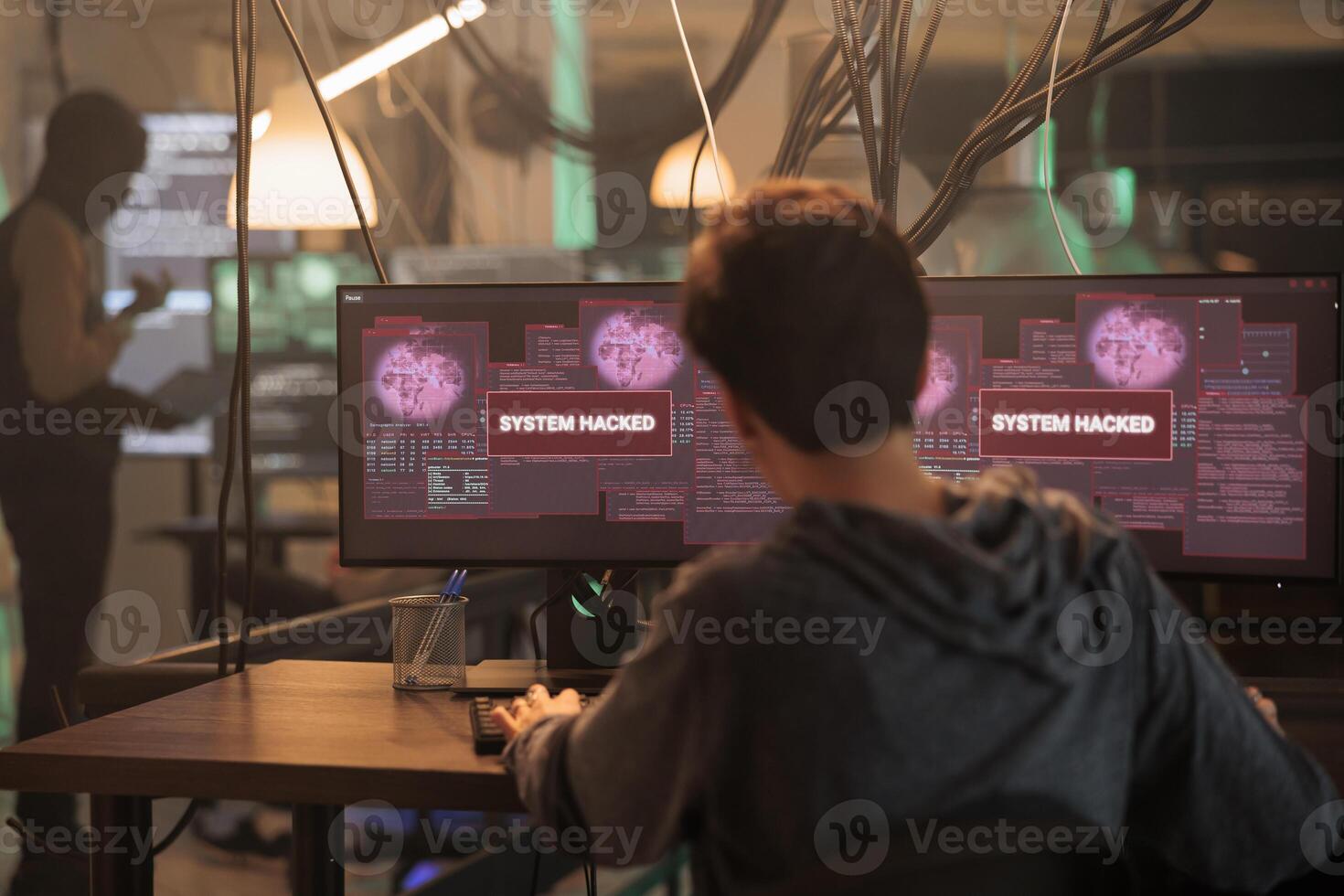 Criminal hacking computer system password, stealing finances, sending virus, cybercrime. Cyberattack, woman creating malicious software, breaking into database server at night time photo
