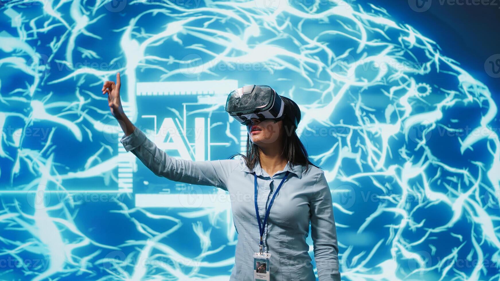 IT expert using VR headset, programming artificial intelligence computing simulating human brain. Technician uses virtual reality technology to build AI machine learning algorithms, camera A photo