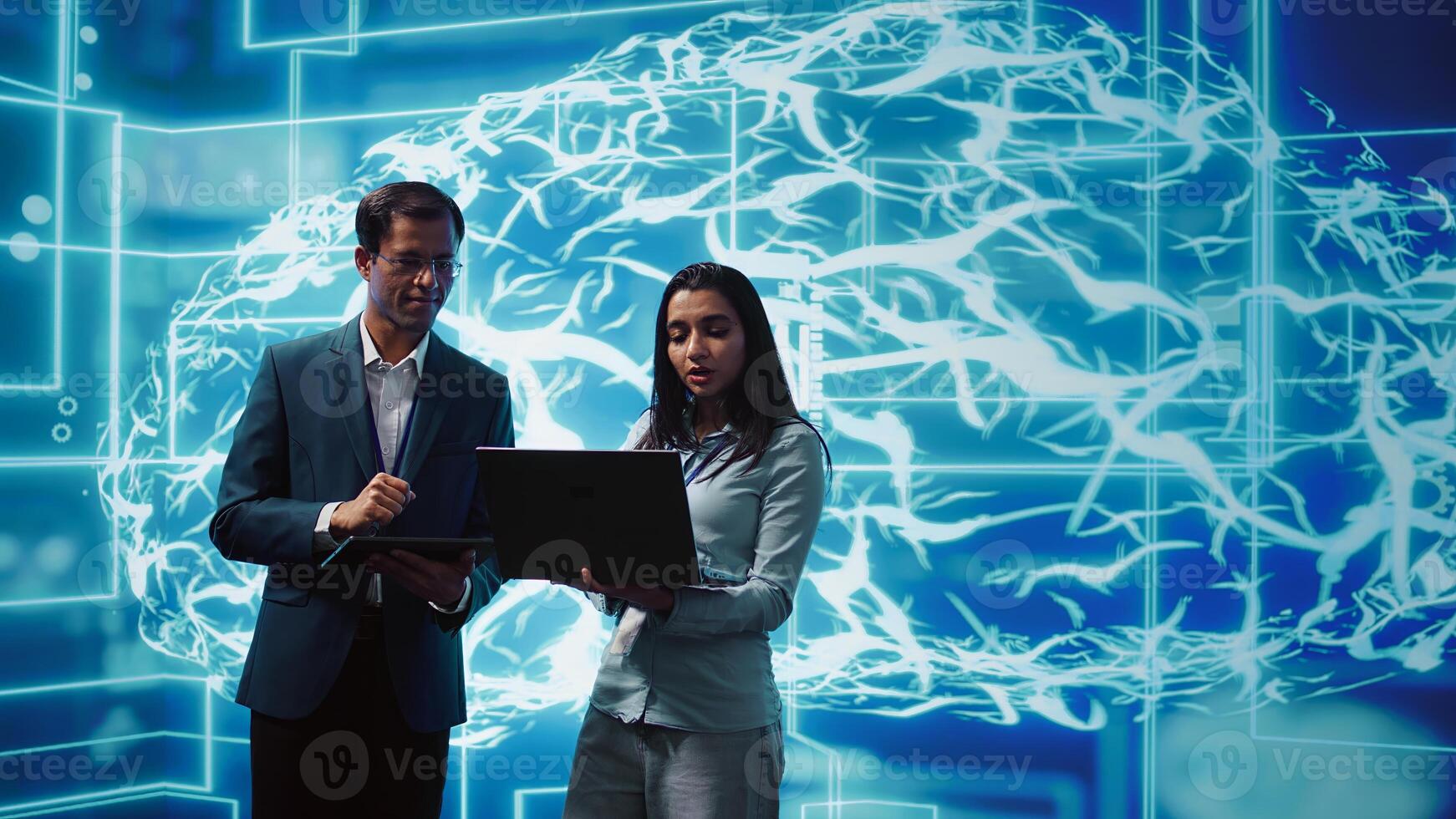 Teamworking colleagues using AI neural networks modeled after human brain to solve complex problems. Team of IT specialists using deep learning to look at data and complete tasks, camera B photo