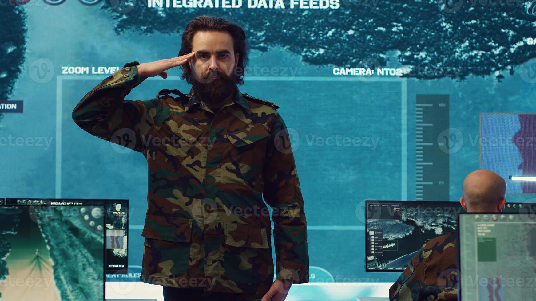 Sergeant presenting his salute with respect for the colonel and high ranking military officers, saluting the captains while he works on intelligence in command center, pride and duty. Camera A. photo