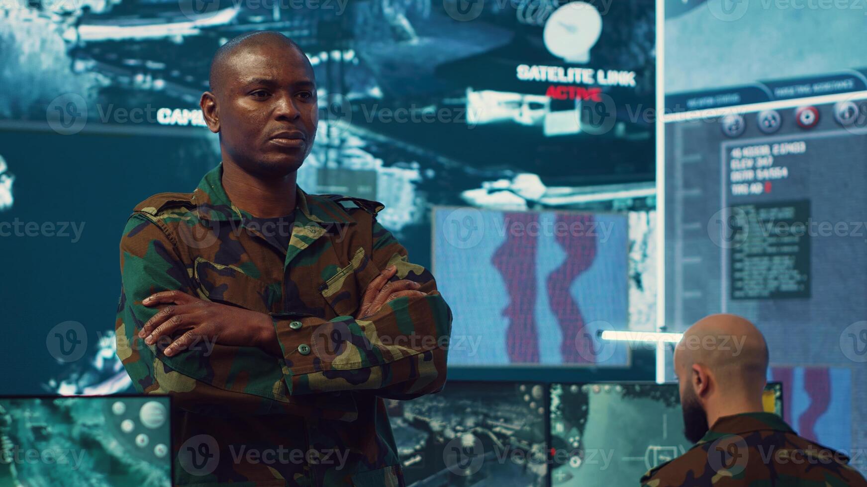Portrait of confident military general wearing camo uniform in mission control center, overseeing operations regarding the national safety and protocol. Federal army base command post. Camera A. photo