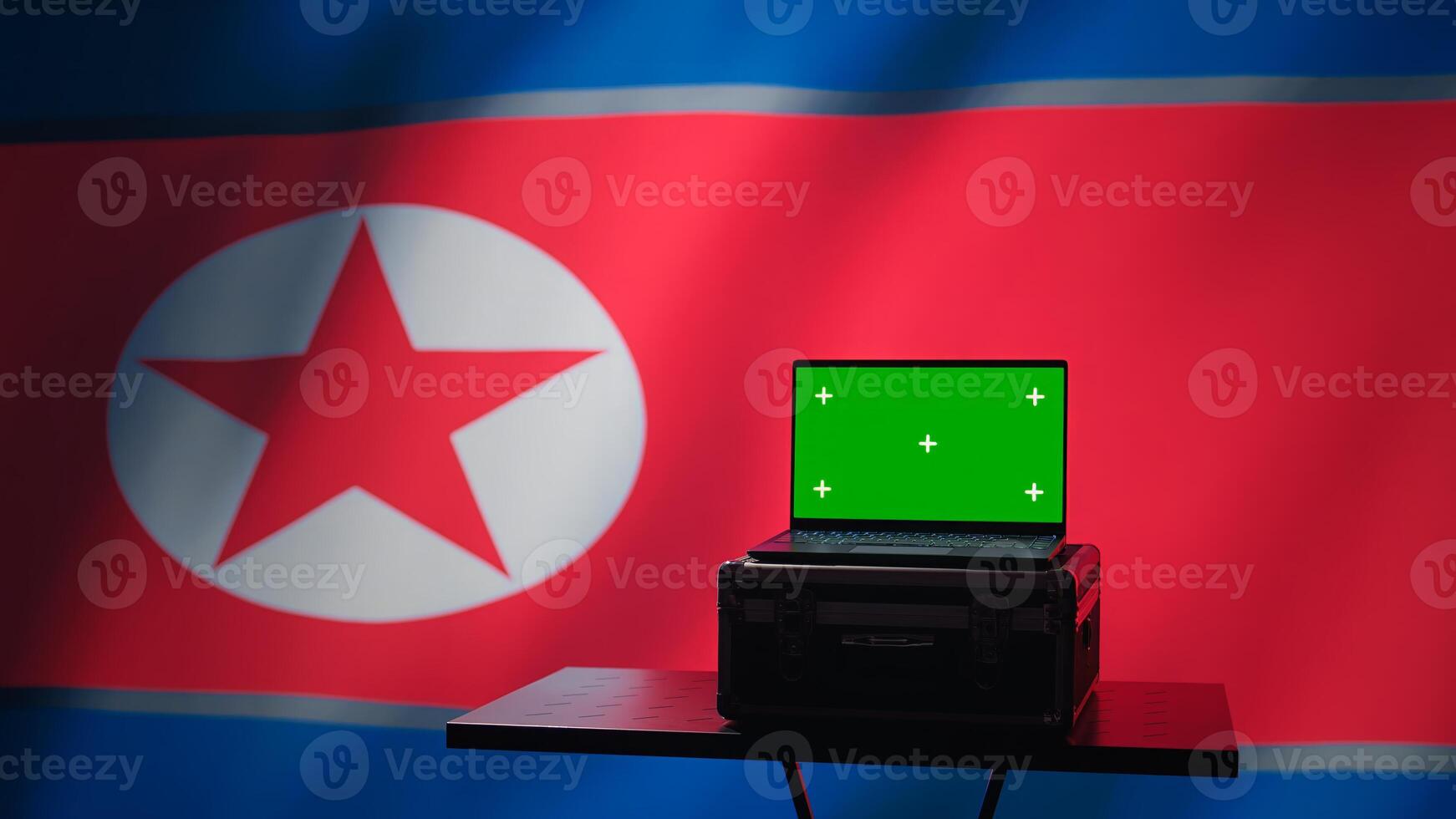Isolated screen laptop in Pyongyang intelligence command center used by dictatorship party to run security protocols against NATO and South Korea enemies, isolated over North Korea flag, camera B photo