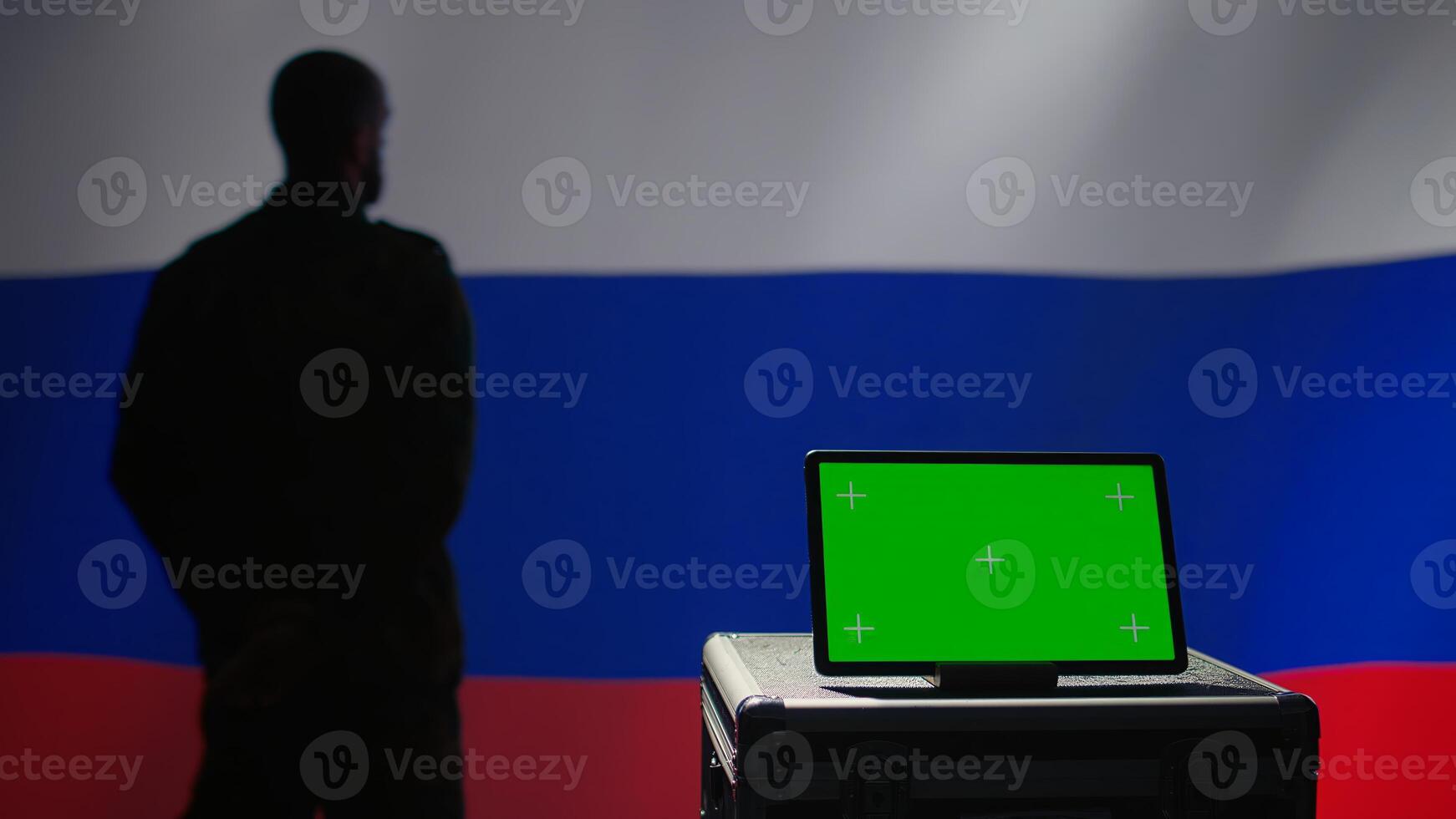 ex KGB FSB secret police agent using mass propaganda tools on green screen laptop to influence population minds. Russian spy silencing online opposition voices using mockup notebook, camera B photo