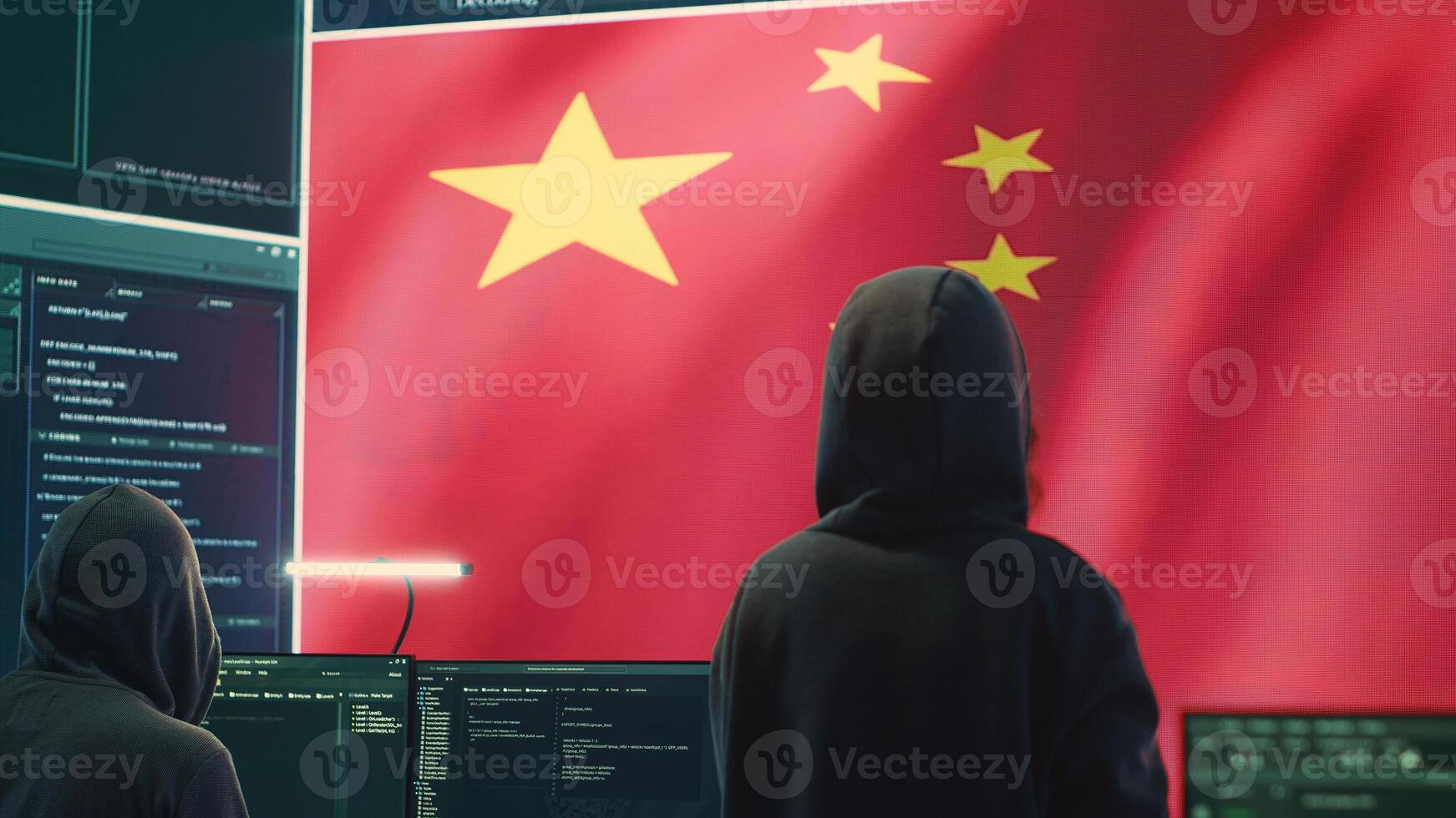 Governmental hacker in high tech office with Chinese flag shown on big screen, IT expert engaged in cyber espionage and criminal activity. Spreading fake news and brainwashing the nation. Camera A. photo