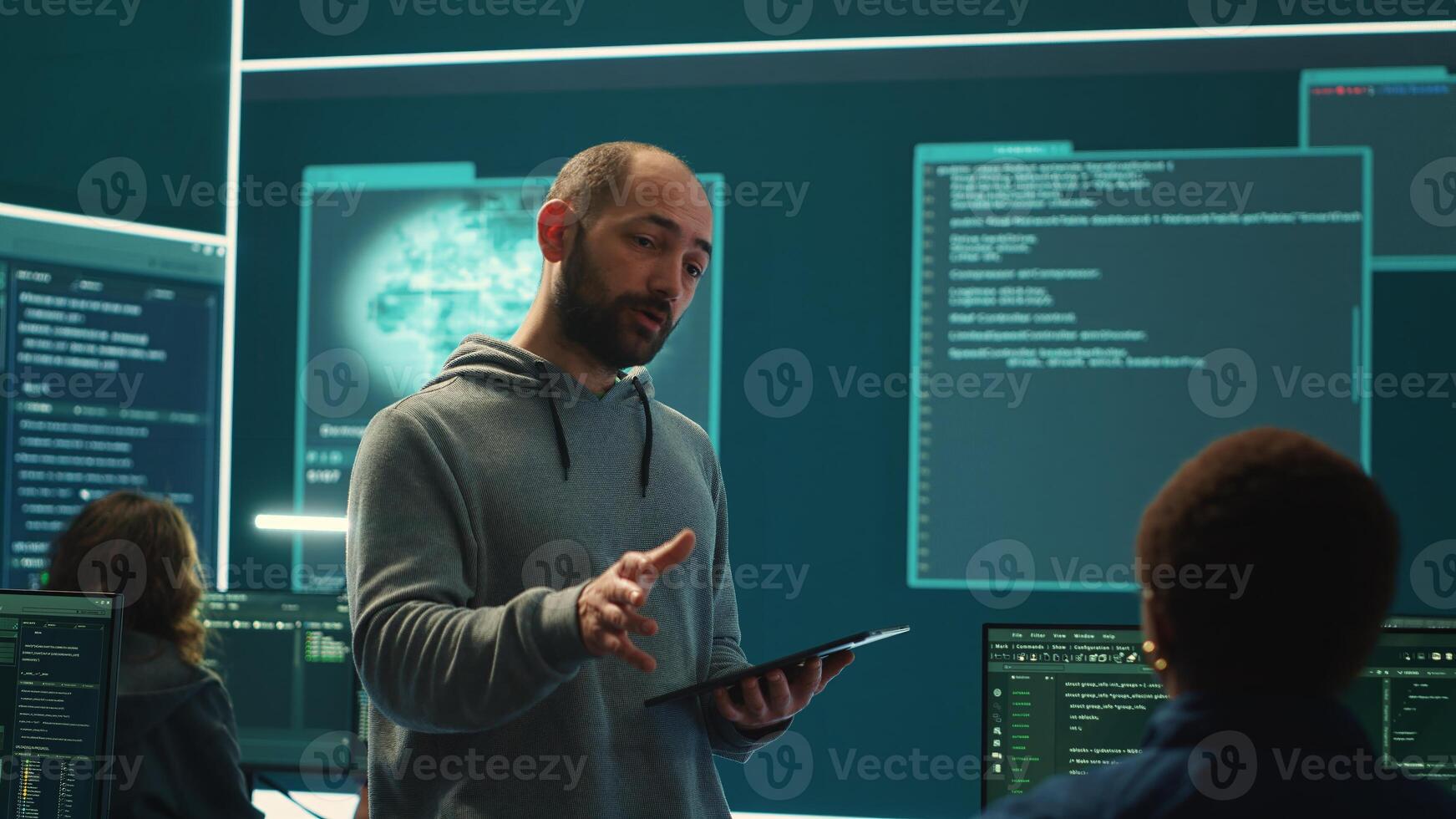 Governmental cyber defense team using advanced technology to secure information, cyber operations in high tech monitoring center. Working on data protection and threat detection. Camera A. photo