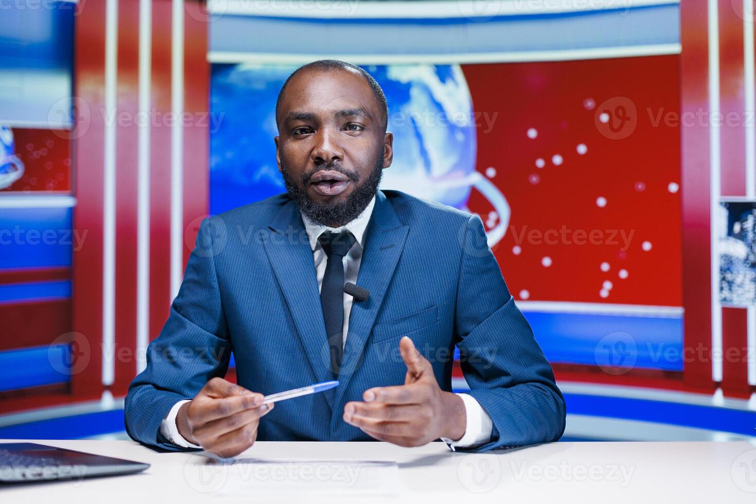 Journalist covering all news topics on tv show, presenting information exclusive from media outlets on international network. African american presenter reporting breaking news stories. photo