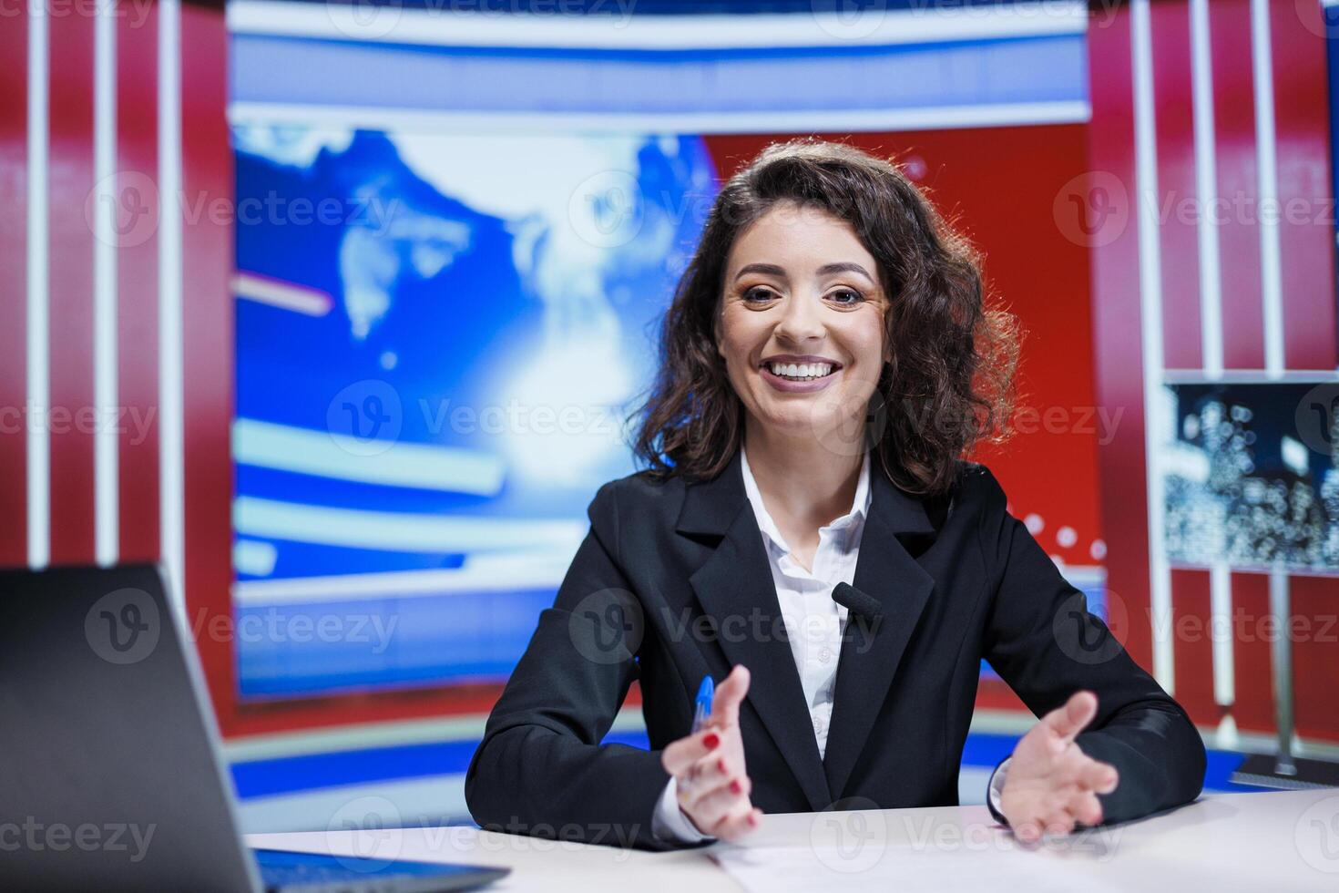 Presenter going on live transmission in news studio, preparing to cover all important breaking news topics regarding daily events. Woman newscaster hosting media segment on tv channel. photo