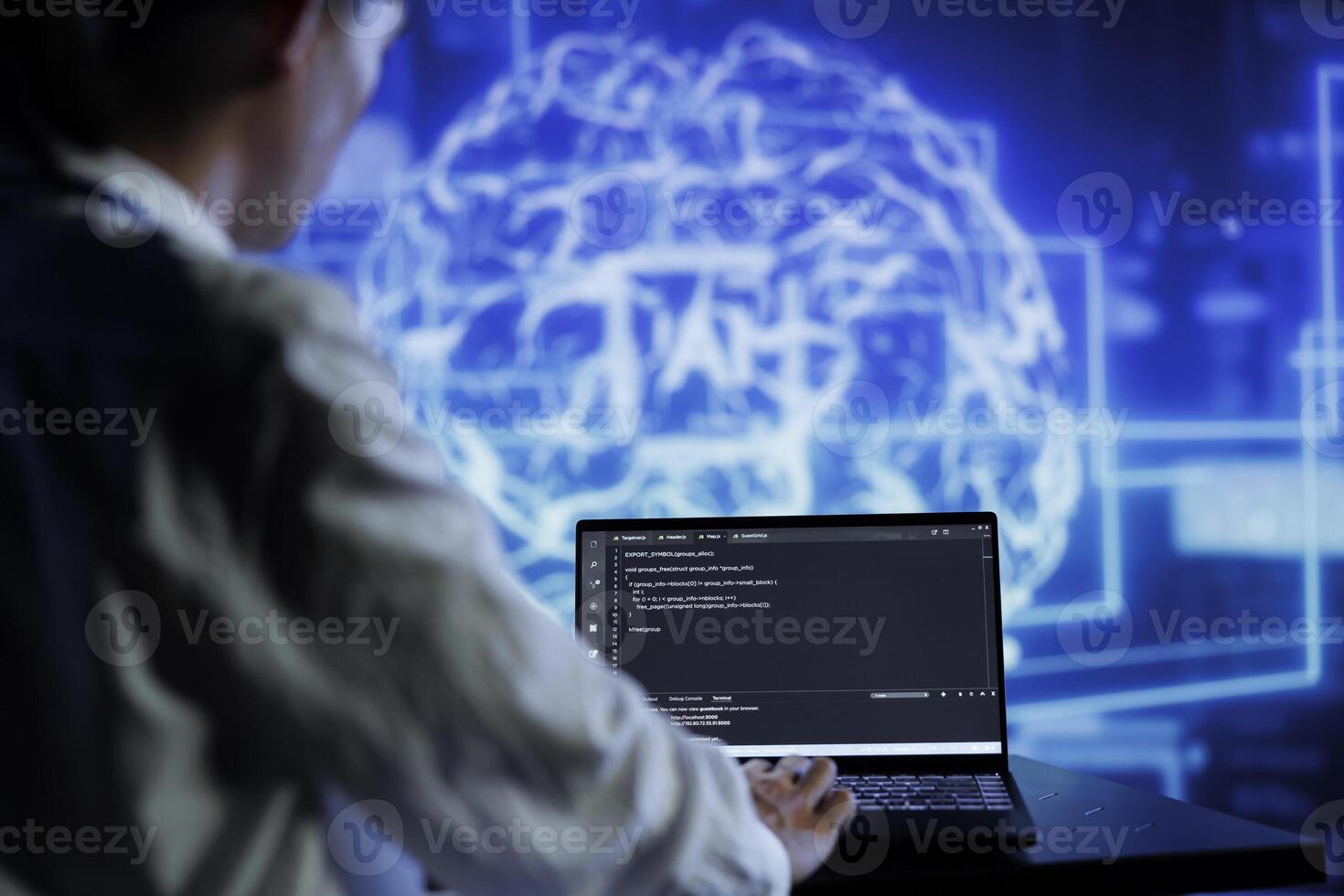 Admin writes code on laptop to visualize artificial intelligence neural networks made up of interconnected nodes using augmented reality technology. Expert running AI script for data processing photo